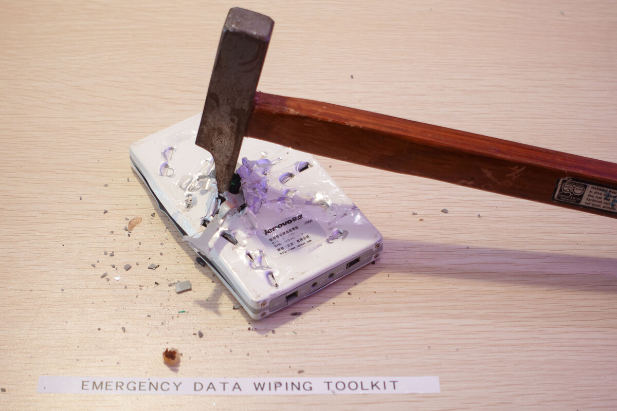 Photo of hammer destroying hard drive